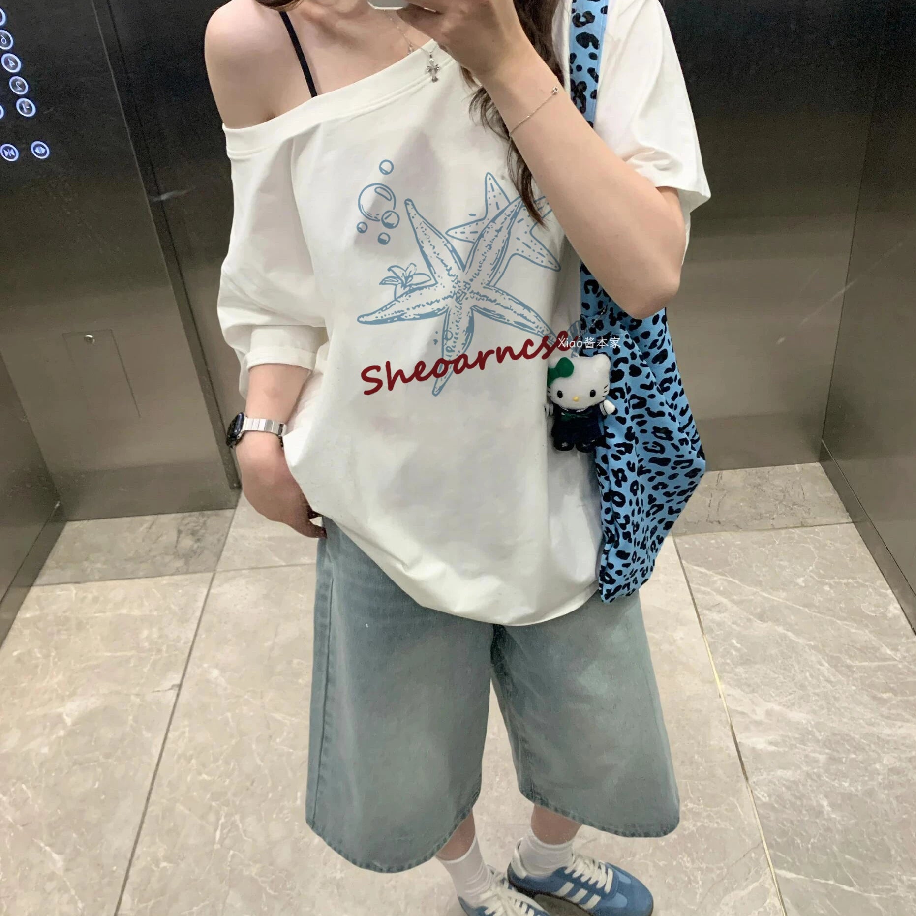 ビーチグラフィックオフショルダーT